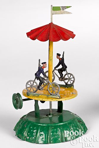 Painted tin cyclist carousel steam toy accessory