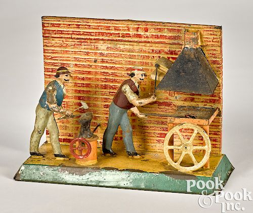 Painted tin blacksmith shop steam toy accessory