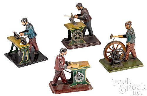 Four Carette factory worker steam toy accessories