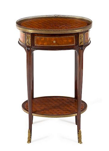 A Louis XV/XVI Transitional Style Gilt Metal Mounted Parquetry Side Table Height 27 3/4 x width 17 1/2 x depth 13 inches.