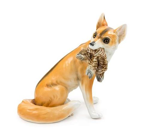 A Capodimonte Porcelain Fox Figure Height 11 1/2 inches.