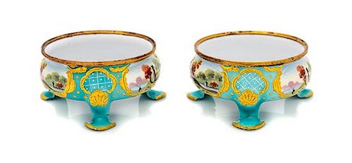 A Pair of Battersea Enameled Open Salts Height 1 3/8 x diameter 3 inches.