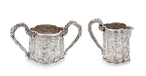 A Japanese Silver Creamer and Sugar Set, Three-Character Mark, First Half 20th Century, each body worked to show repousse bamboo
