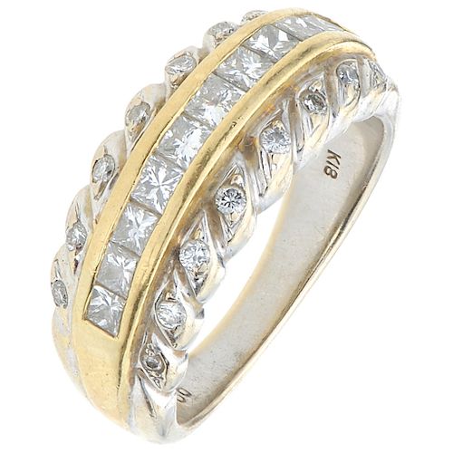 A diamond 18K white and yellow gold ring.