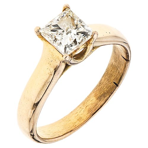 A 14K yellow gold solitaire ring.