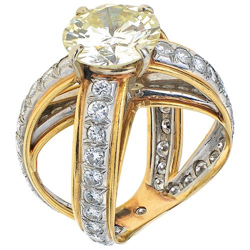 A diamond 14K yellow and white gold ring.