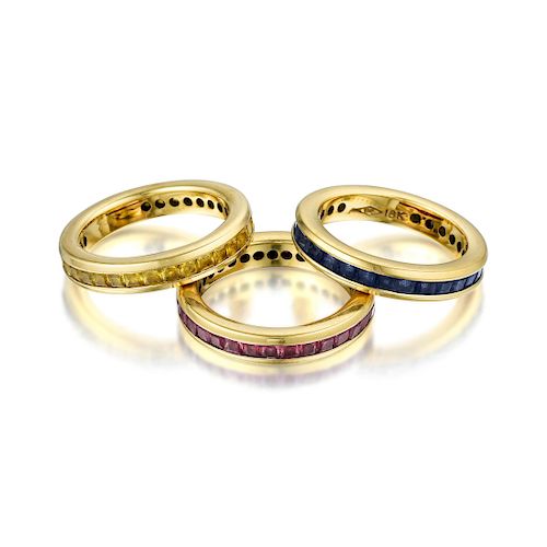 A Set of 18K Gold Ruby and Sapphire Rings