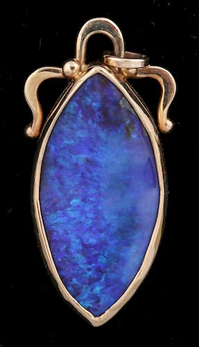 A 14K GOLD AND OPAL PENDANT SIGNED MICKY ROOF