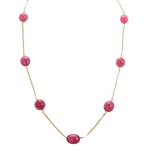 A Ladies Ruby Station Necklace in 14K Gold