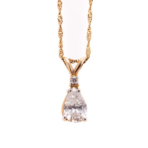 A Ladies Pear Shape Diamond Pendant in 14K
