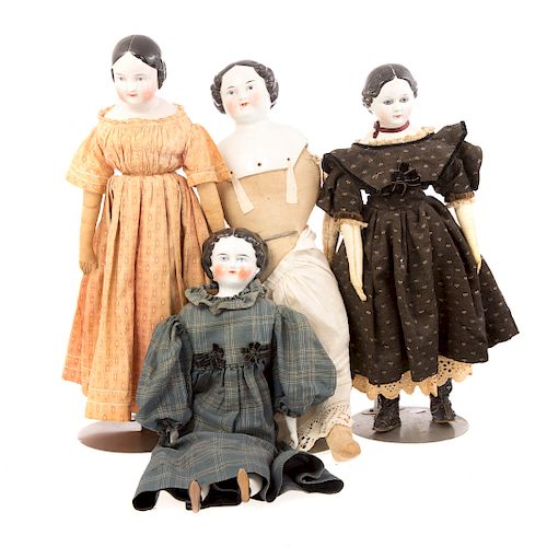 Four china head dolls