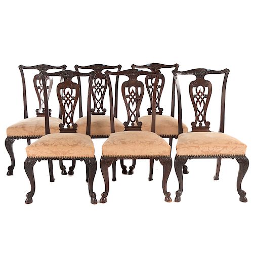Six Continental carved mahogany dinning chairs