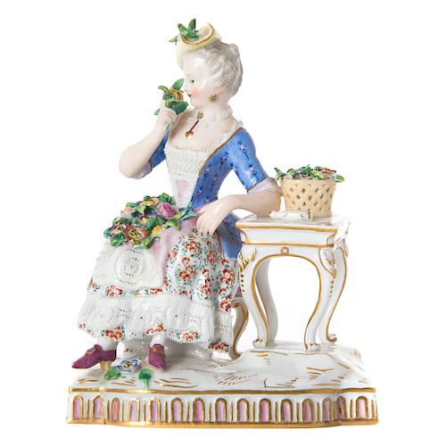 Meissen porcelain seated woman figure