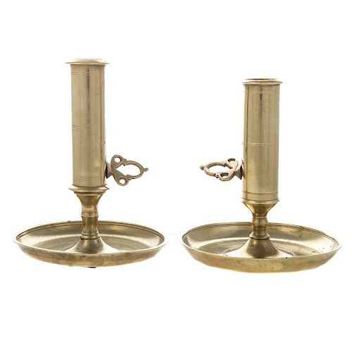 Two French brass chambersticks