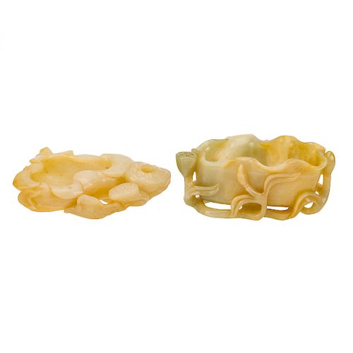 Two Chinese carved jade lotus-form water dippers