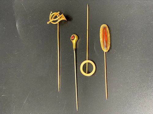 Four Gold Stick Pins