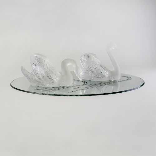 Pair of Lalique Frosted and Molded Glass Swans and an Etched Mirror Glass Base