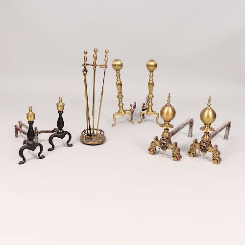 Three Pairs of Brass Andirons and a Set of Brass Fireplace Tools