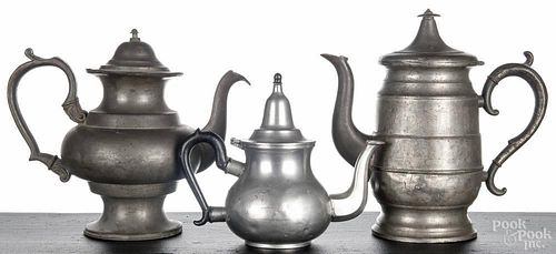 Two Continental pewter coffee pots, 19th c., tallest - 10 3/4'', together with a pewter teapot, 8 1/4