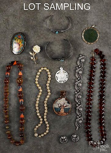 Assorted costume jewelry, to include two Southwestern style bracelets, one is sterling