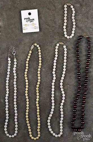 Group of pearl jewelry, to include four pearl necklaces, a bracelet, and two pairs of earrings