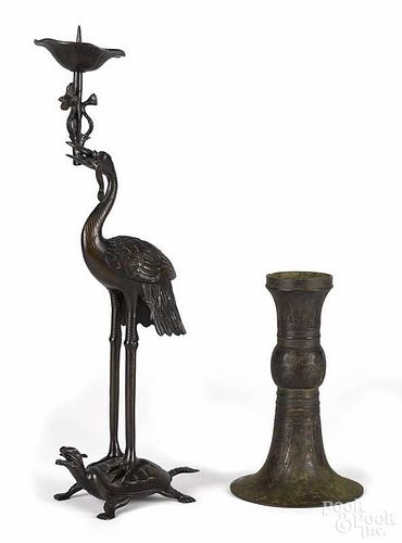 Chinese bronze burner, 20th c., 9 3/4'' h., together with a crane-form pricket stick, 21'' h.