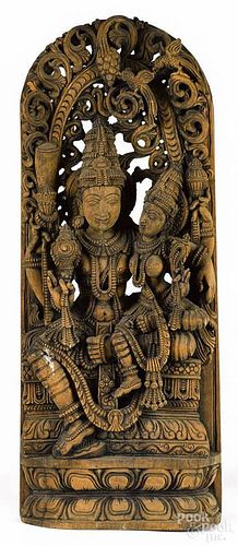 Carved wooden Hindu religious plaque, 36'' h., 13 1/2'' w.