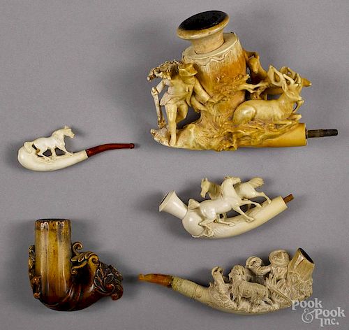 Five carved meerschaum pipes, largest - 4'' h., 5 3/4'' w.