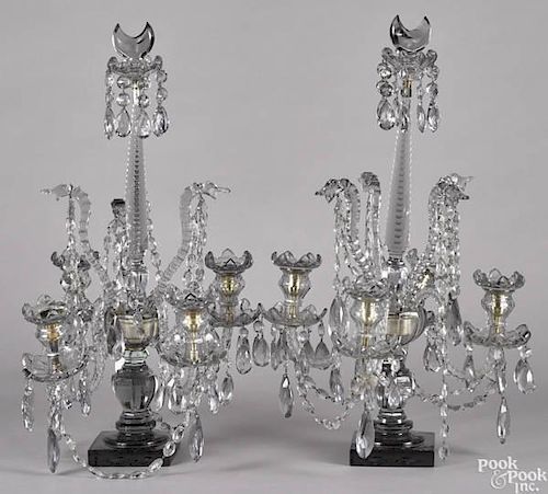 Pair of crystal candelabra, early 20th c., with crescent finials and four candle arms