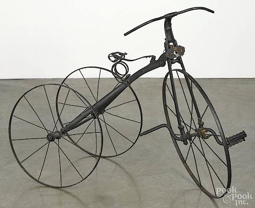 Child's iron tricycle, early 20th c., 28'' h., 37'' l.