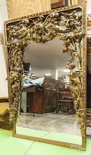 Giltwood mirror with Chinese architectural surround, 54'' h., 35'' w.