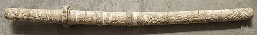 Japanese carved bone sword with a scabbard, 28'' l.