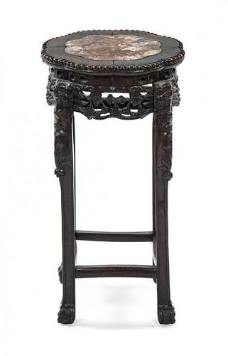 * A Hardwood and Marble Jardiniere Stand Height 23 3/4 x Diameter 12 3/4 inches.