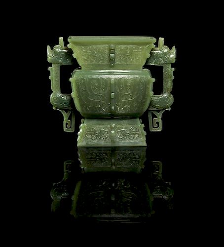A Jade Archaistic Vase, Fang Zun Height 5 inches.