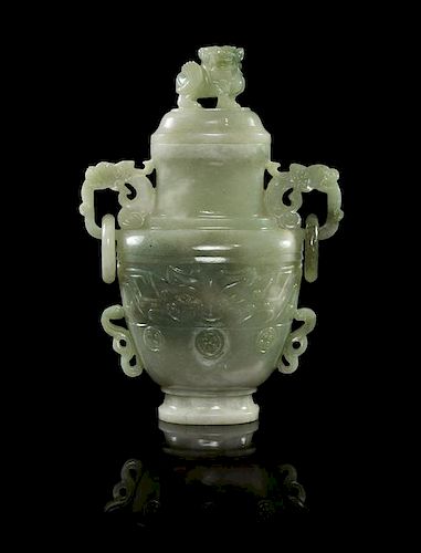 * A Carved Celadon Jade Vase and Cover Height 5 3/4 inches (without stand).