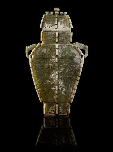 * A Jade Archaistic Vessel and Cover Height of tallest 11 x width 8 inches.