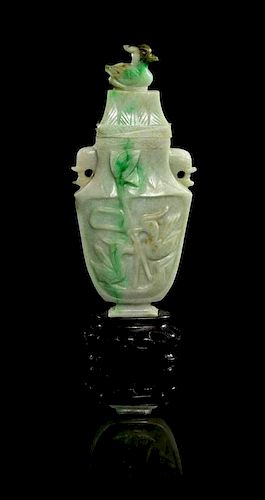* A Jadeite Vase and Cover Height 5 1/4 inches (with stand).