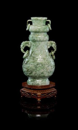 A Jadeite Hu and Cover Height 7 inches.