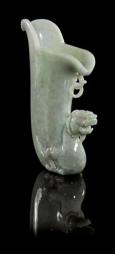 A Carved Jadeite Libation Cup Height 5 3/4 inches.