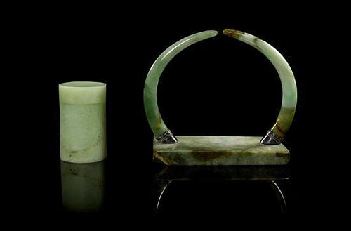 * Two Jadeite Articles Length of longest 4 5/8 inches.