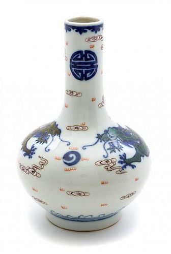 A Blue and White and Famille Rose Porcelain Dragon Vase Height 8 inches.
