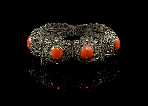 A Coral Inset Silver Filigree Bracelet Diameter 2 1/2 inches.