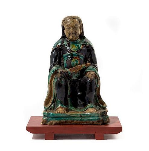 A Polychrome Glaze Stoneware Figure of Immortal, Zhen Wu Da Di Height 9 3/4 inches
