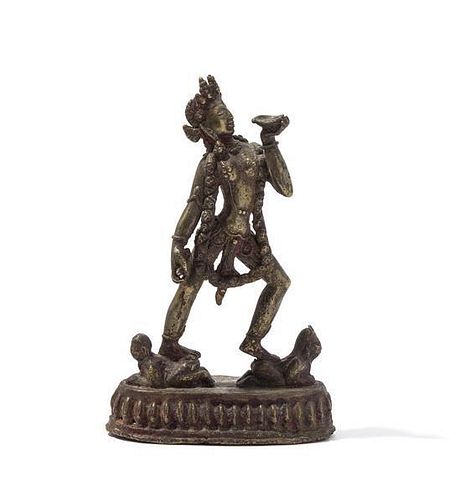 A Gilt Bronze Figure of a Vajrayogini Height 7 inches.