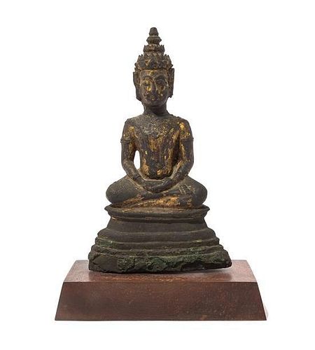 A Gilt Bronze Figure of Buddha Height 9 3/4 inches.