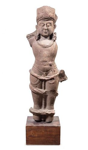 An Indian Sandstone Figure Height 39 1/2 inches.