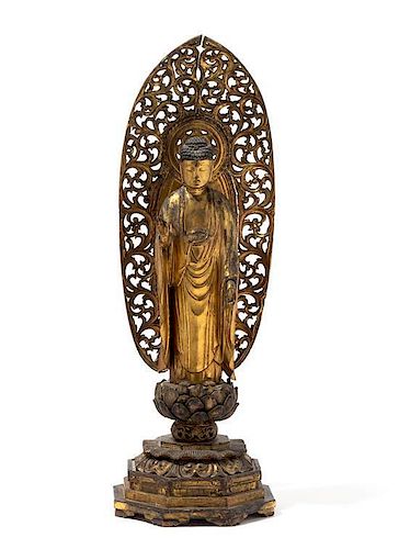 * A Japanese Gilt Lacquer Figure of Buddha Shakyamuni Height overall 24 inches.