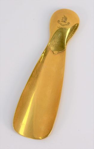 Tiffany & Co. 18 karat gold shoe horn. length 6 3/4 inches, 87.6 grams Provenance: Estate of Eileen Slocum located in the Harold...