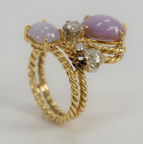 18 karat gold diamond and lavender star sapphire ring, set with two oval lavender star sapphires, 7.75 cts. total and five round dia...