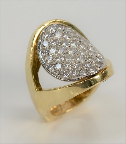 18 karat gold ring set with oval panel of forty diamonds. size 5 1/2, 16 grams total weight